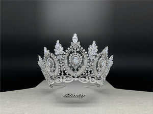 Ideal for Wedding, Wedding Rehearsal, Anniversary, Quinceanera, Prom, Pageant and any other special occasion. This Magnificent Tiara is a favorite of Brides and Quince. A Tiara for Bride who is selective and bold. 