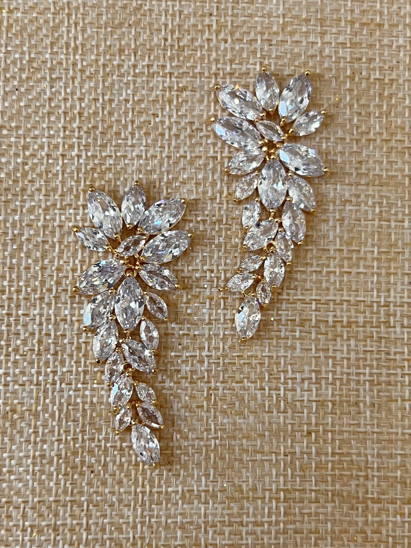 These dazzling earrings are crafted from the finest materials, from a single strand of Swarovski crystals to 18-karat white gold. These earrings will bring sophistication and elegance to your look.