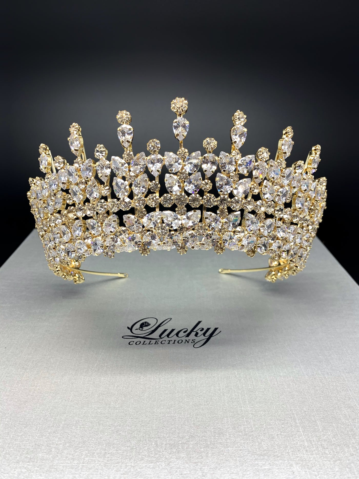 Gold Tiara, Cubic Zirconia, AAA CZ  adorn this Royal Tiara. Made with Marquise Zirconia and handset  with perfection. Lucky Collections ™