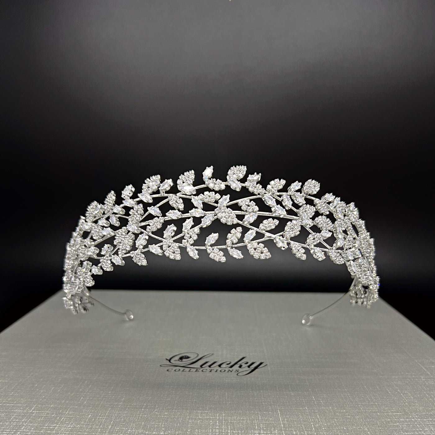 Modernistic Cubic Zirconia Bridal Headband keeps your hair back while you focus on your joyous occasion.