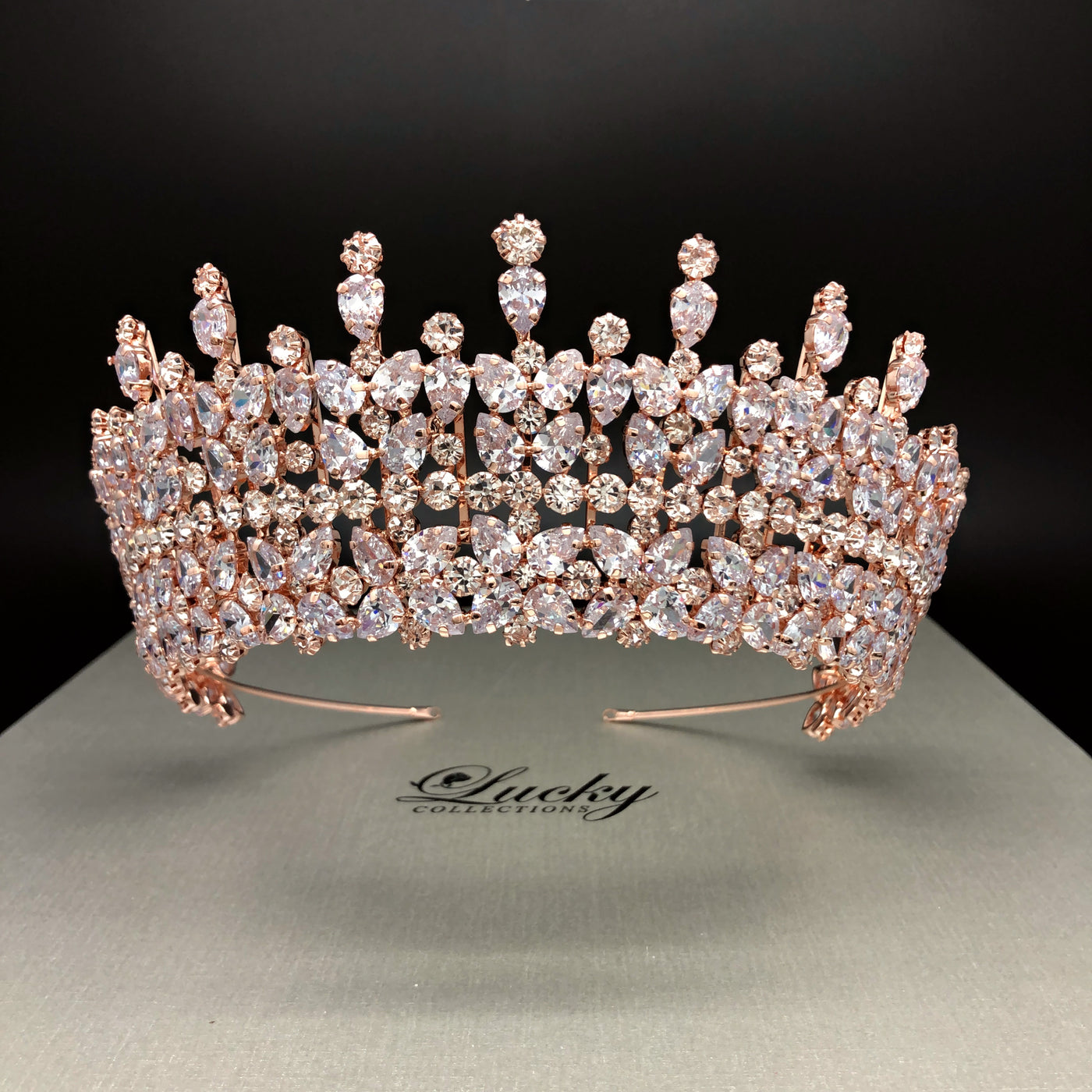 Bridal Tiara, Cubic Zirconia, AAA CZ adorn this Royal Rosegold Tiara. Made with Marquise Zirconia and handset with perfection. Lucky Collections ™